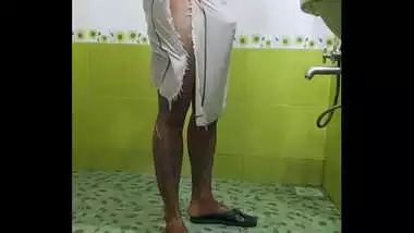 Indian boy bathing in towel