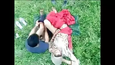 Bearded man penetrates an Indian MILF on green grass in outdoor porn