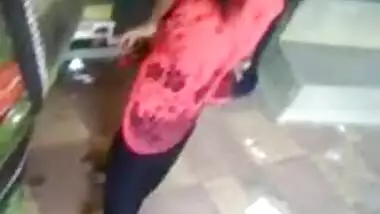Satin girl fingering her pussy in public