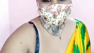 Sweet Desi fatty with a mask reveals her XXX tits and sexy body