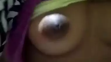 Indian girl willingly exposes round XXX boobies and flashes pussy