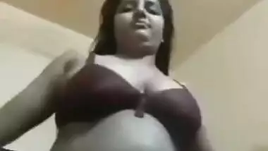 Desi Village girl showing her boobs and fingering pussy