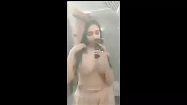 Indian hot sexy college babe showing her boobs