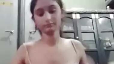 Sexy young Desi girl is a XXX model with wonderful small boobies