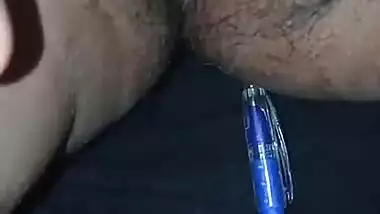 Horny Indian girl masturbating with a pen