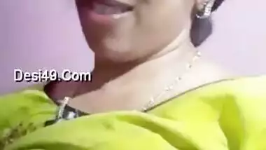 Attractive Indian teen gladly plays with her XXX boobs and nipples