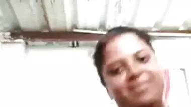 Cheerful Desi woman goes to take a shower after watching a porn movie